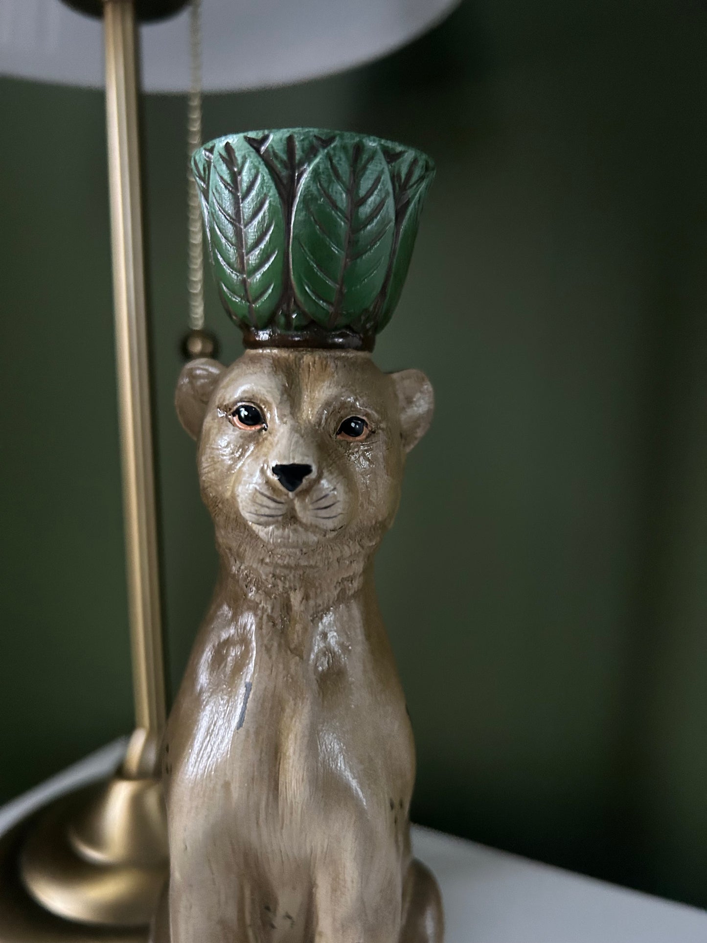 Pair of leopard and leaf candlestick holders