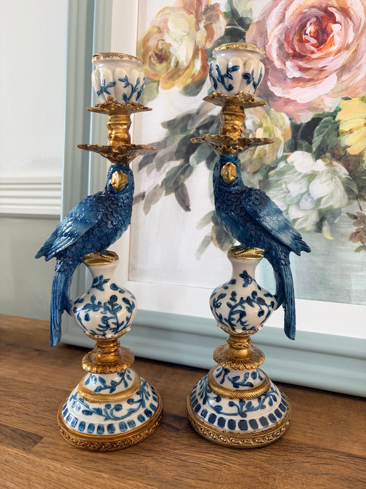Hollywood Regency blue and white parrot candlestick pair