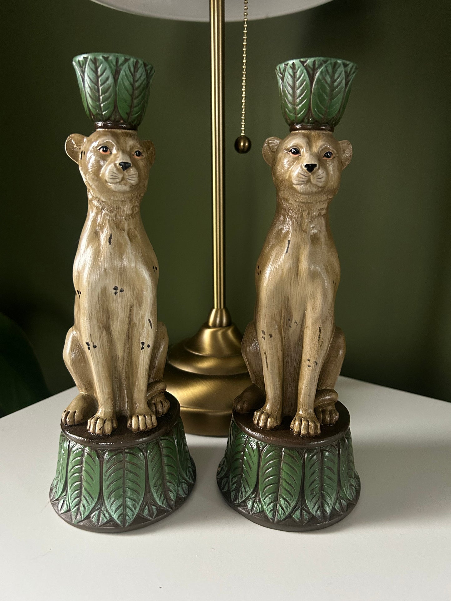 Pair of leopard and leaf candlestick holders