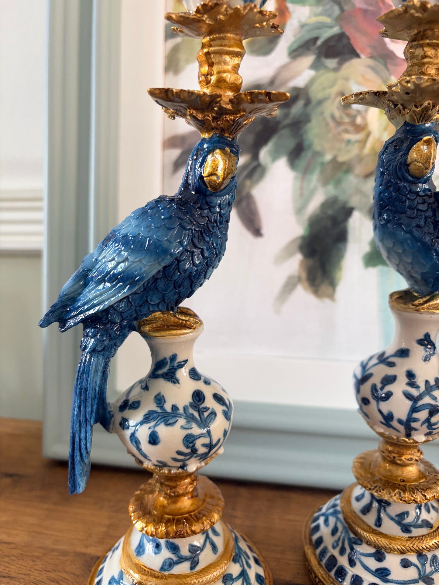 Hollywood Regency blue and white parrot candlestick pair